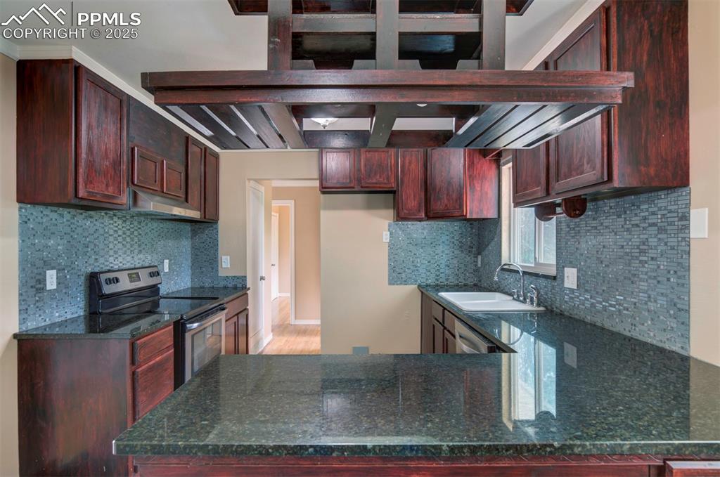 Image 3 of 42: Beautifully updated kitchen