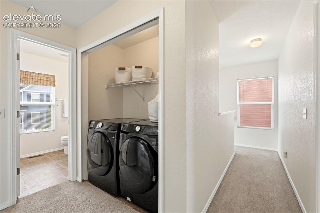 Image 26 of 48: Upper Level Laundry by bedrooms