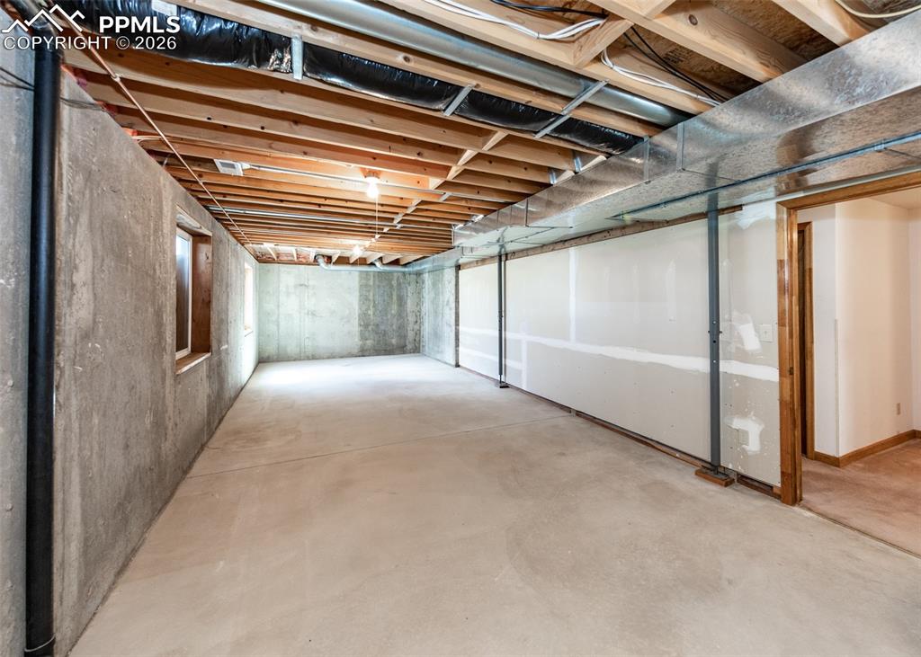 Image 48 of 50: Unfinished basement Room with Walkout