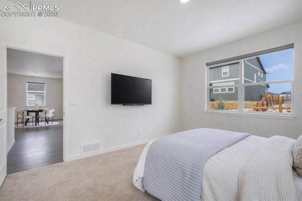 Image 23 of 50: Master Bedroom