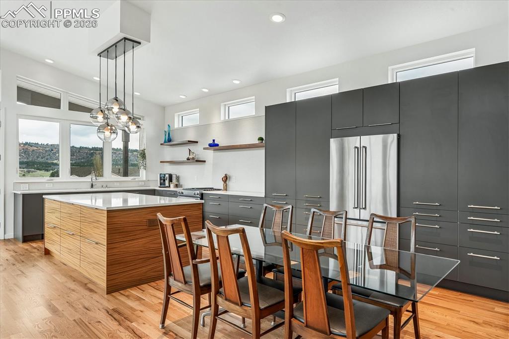 Image 23 of 50: The spacious gourmet kitchen can also be utilized as an eat-in kitchen.