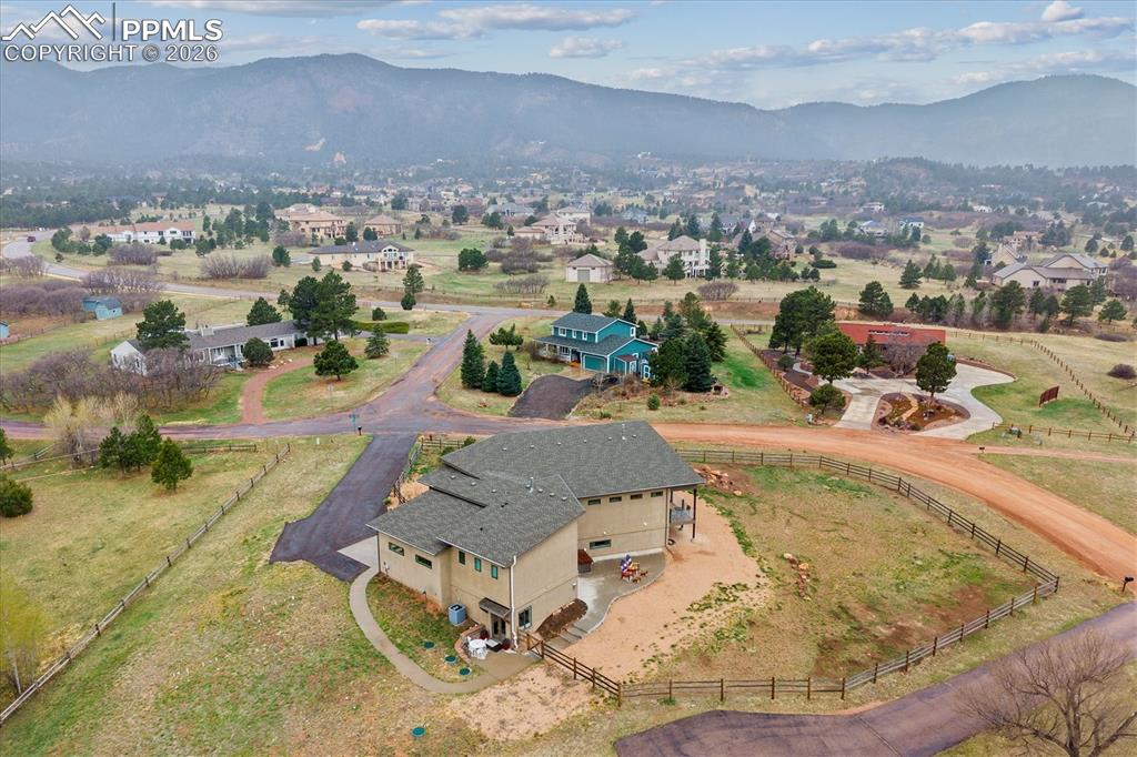Image 5 of 50: Cloven Hoof Estates Aerial view of the lot with paved driveway leading up t