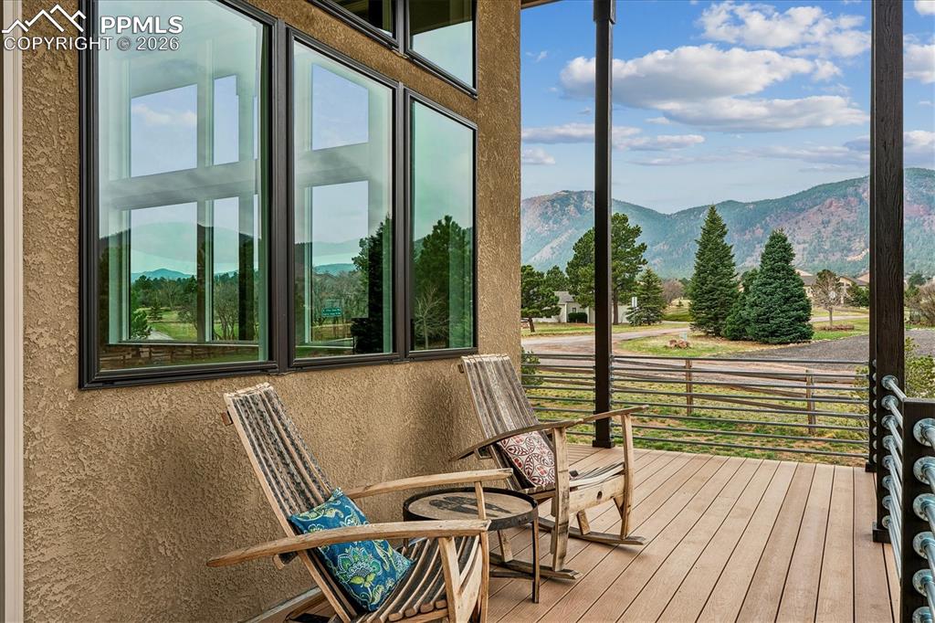 Image 7 of 50: Mid-Century Modern custom home on .77 acres with a wrap-around porch and su