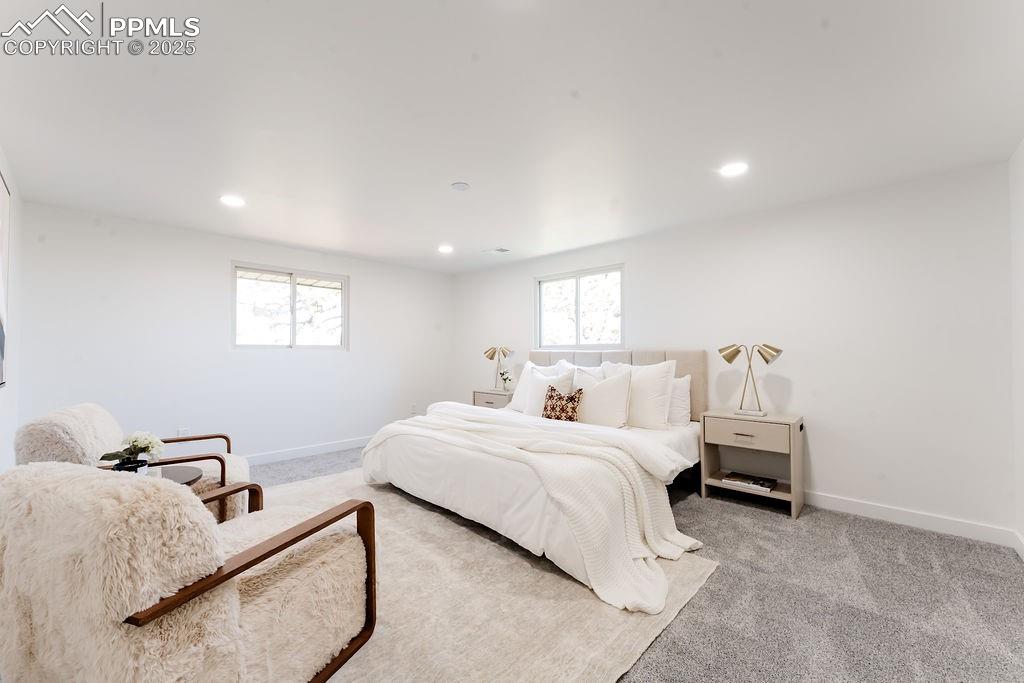 Image 24 of 43: Bedroom with carpet and recessed lighting