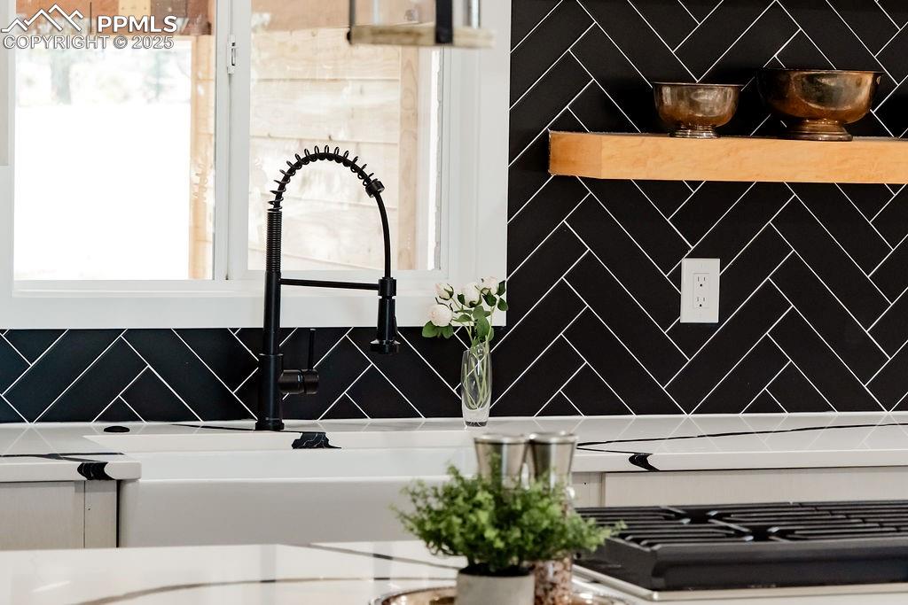 Image 9 of 43: Kitchen view of a sink