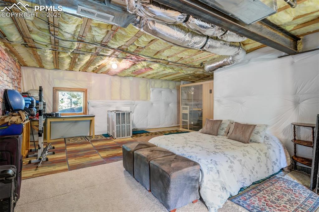 Image 35 of 47: Additional bonus space that is unfinished off the Utility Room with a Sauna