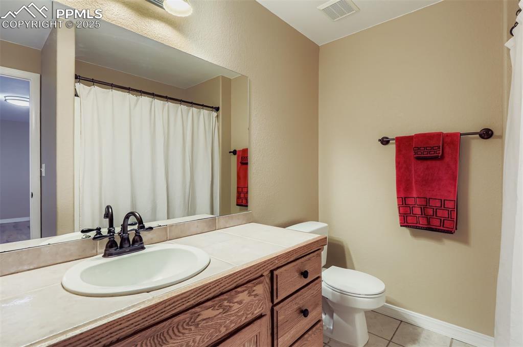 Image 28 of 42: Basement secondary bathroom