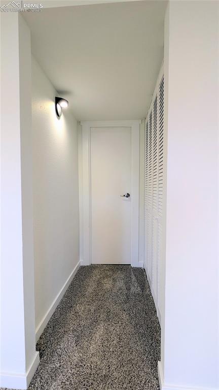 Image 22 of 39: Hall featuring baseboards