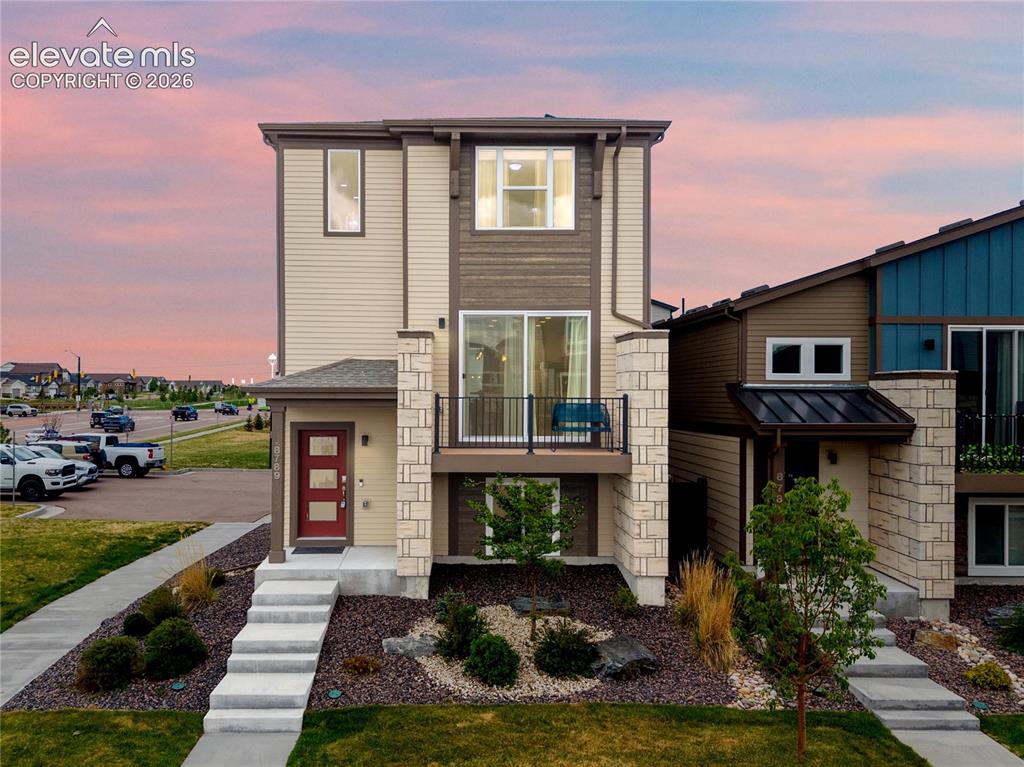 Image 1 of 43: twilight photo of the front of the home