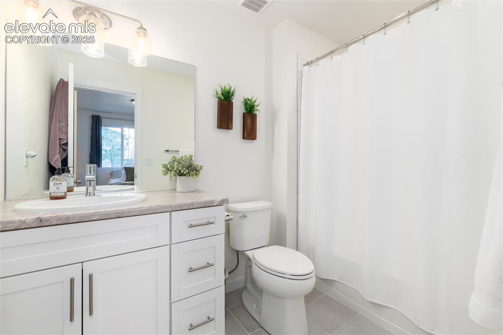Image 34 of 43: en-suite to the lower level bedroom