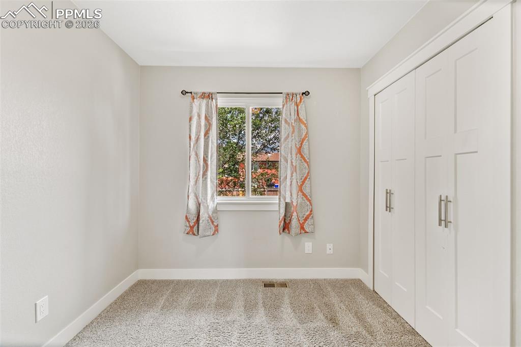 Image 24 of 39: Bedroom