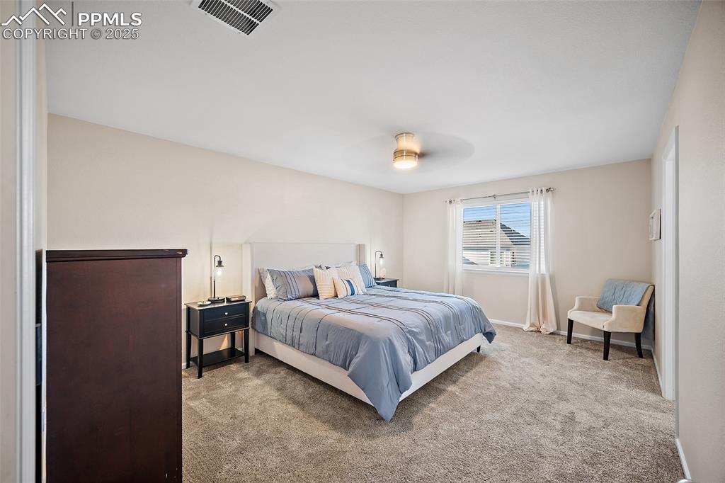 Image 25 of 50: Master Bedroom