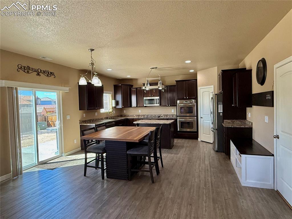 Image 6 of 30: Kitchen & Dining Room