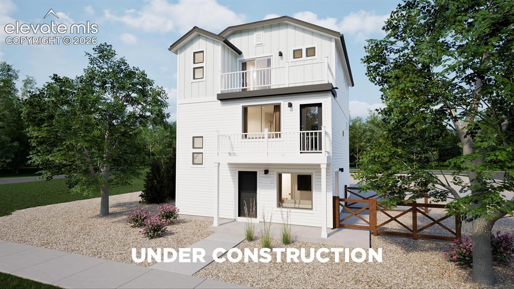 Image 1 of 22: Multi-level exterior with white siding, multiple balconies, and a dark-tone