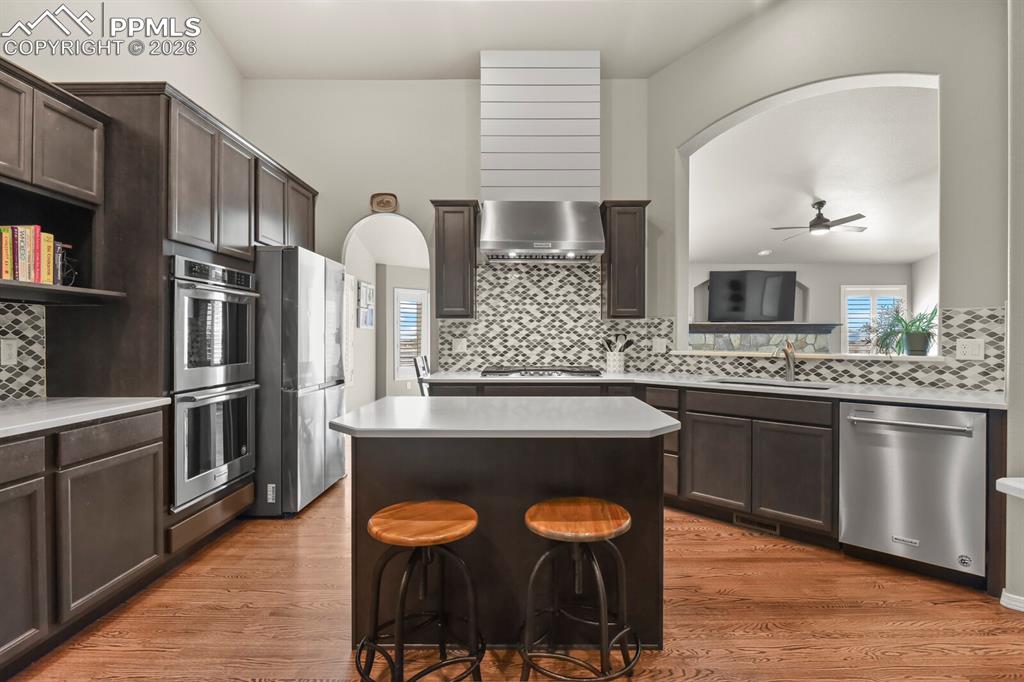 Image 18 of 49: Vaulted ceiling and canned lighting in the kitchen