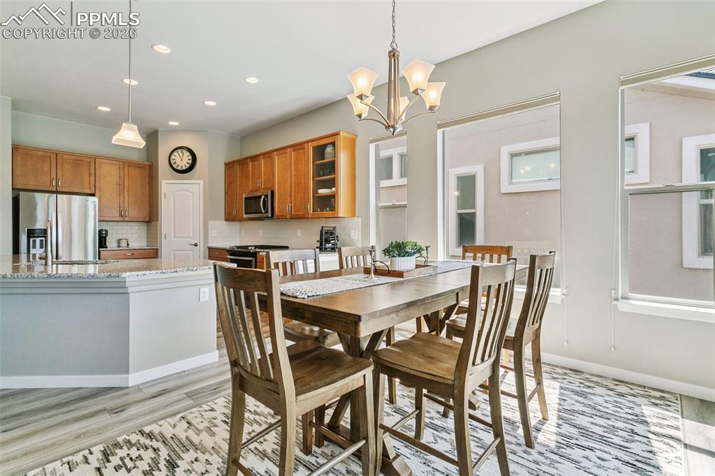 Image 16 of 50: Dining Area - Adjoins the Magnificent Kitchen