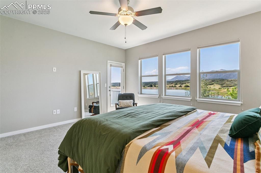 Image 21 of 50: Primary BR - Sweeping Views from the Bed