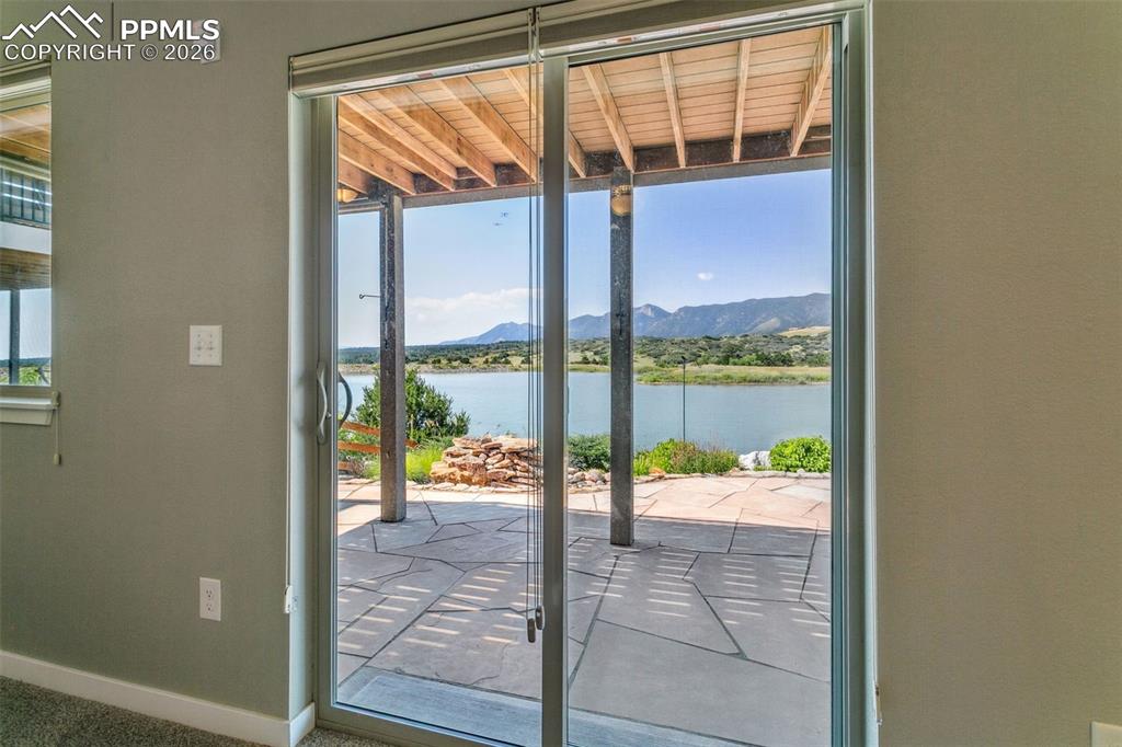 Image 38 of 50: Walk-out to the Large Flag Stone Patio