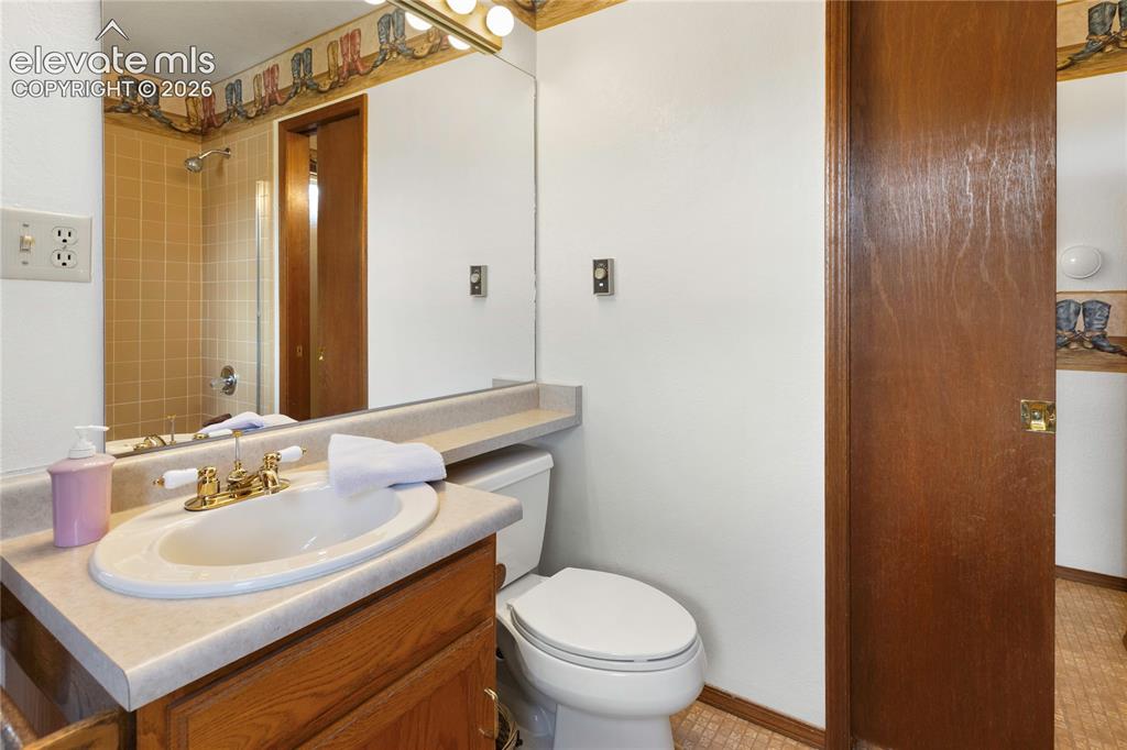 Image 18 of 26: One of two upstairs bathrooms with a unique
