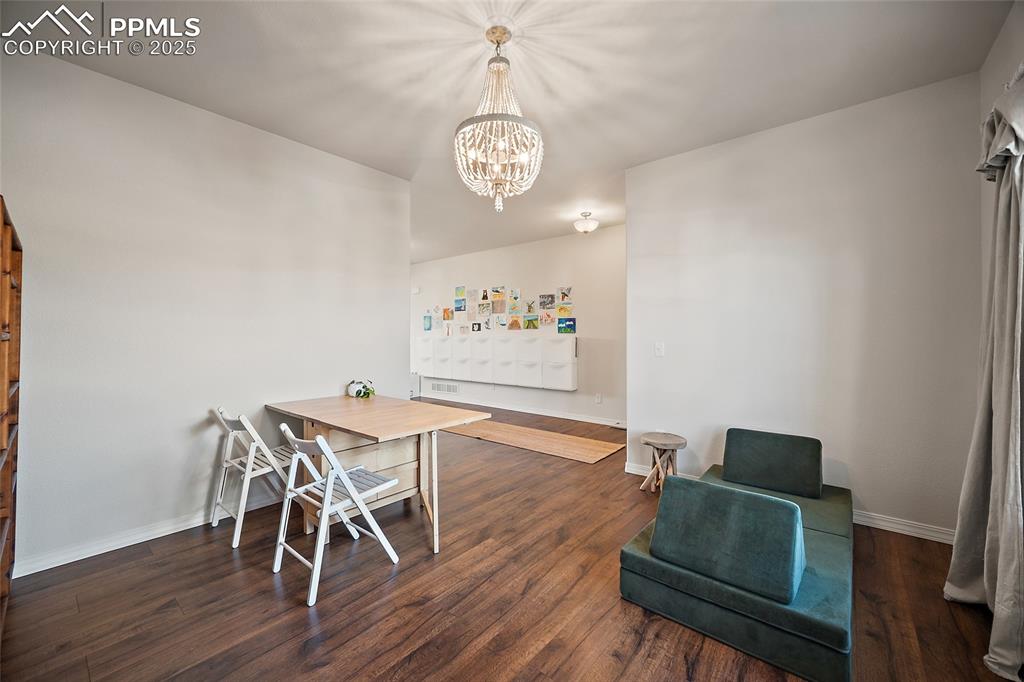 Image 15 of 50: Off the entrance of you home, it can be used as a formal living area also.