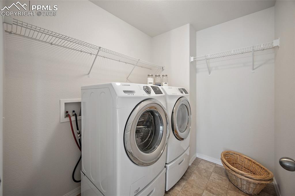 Image 23 of 50: Conveniently located - Upper-Level laundry.