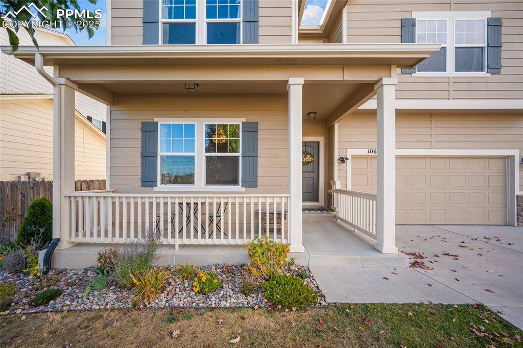 Image 3 of 50: Covered porch to welcome you home!