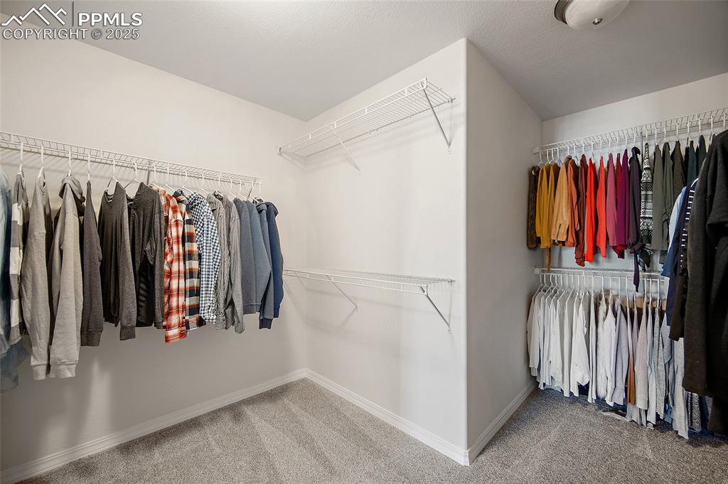 Image 31 of 50: Huge Primary closet.