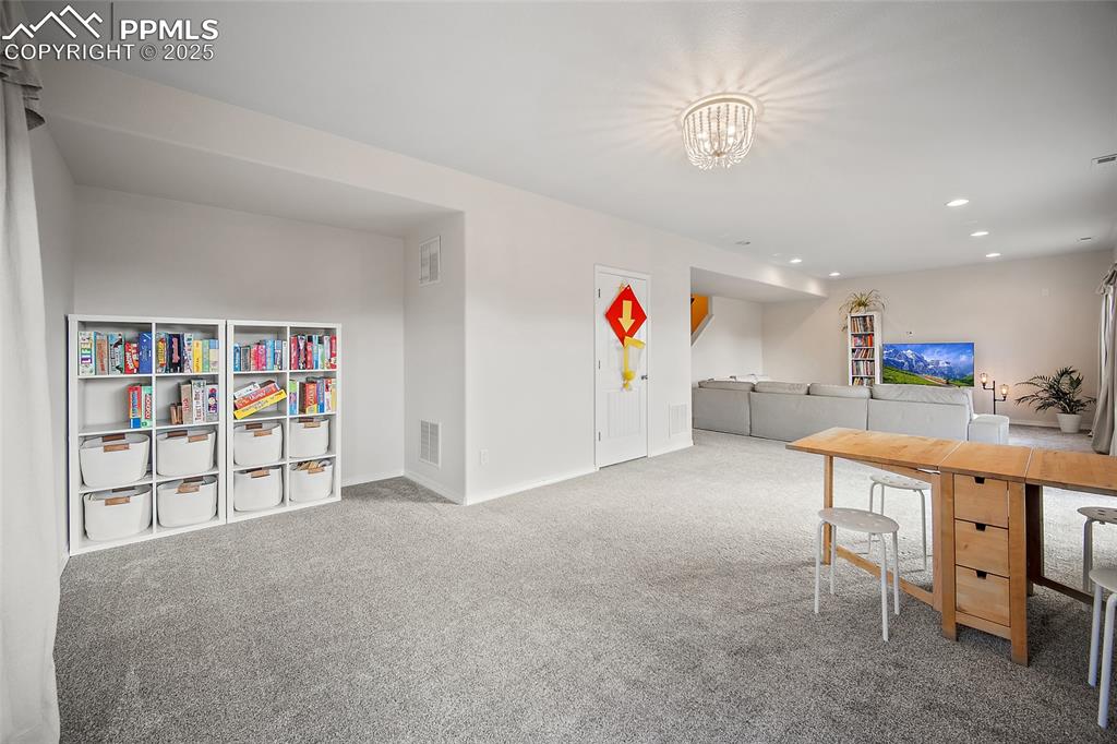 Image 36 of 50: Lower level recreation area for Pool table - Ping Pong anyone?