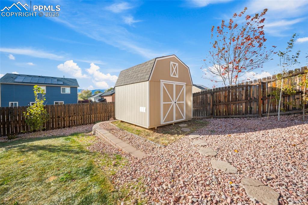 Image 45 of 50: Huge Storage shed.