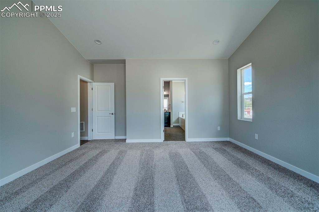 Image 10 of 43: Master Bedroom