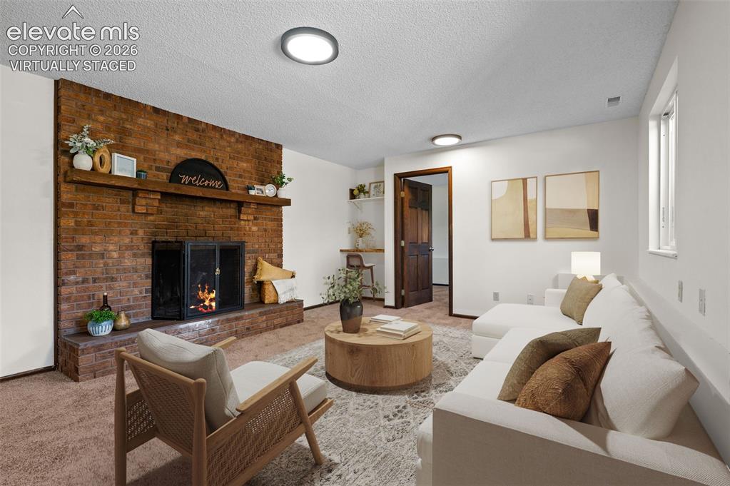 Image 26 of 50: Virtually Staged; Garden Level Family Room