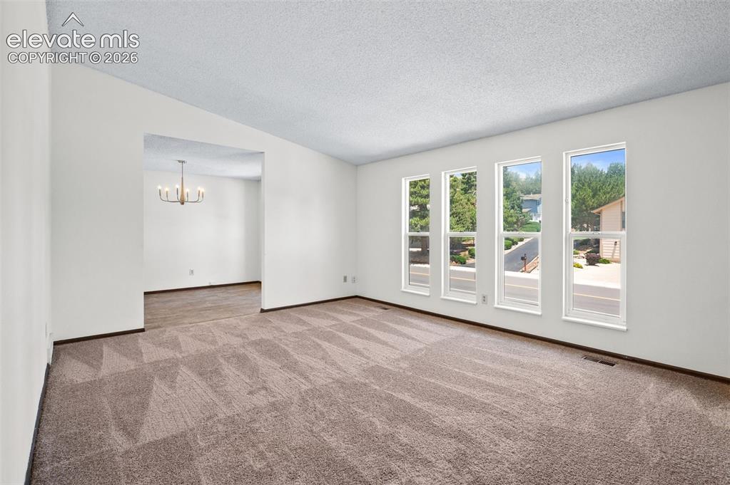 Image 8 of 50: Front, Upper Living Room