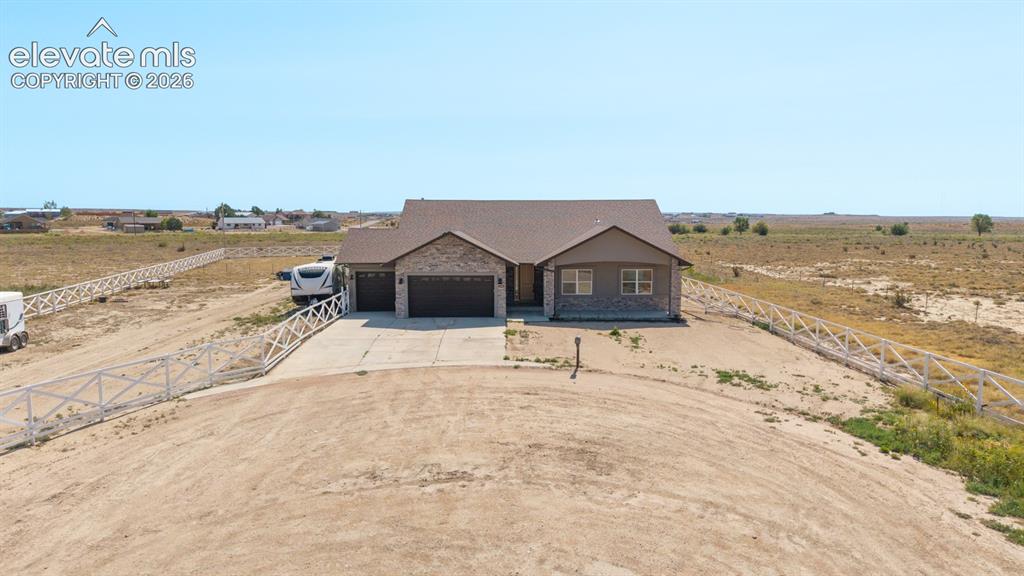 Image 49 of 50: Newly constructed residence situated on expansive grounds featuring a dual-