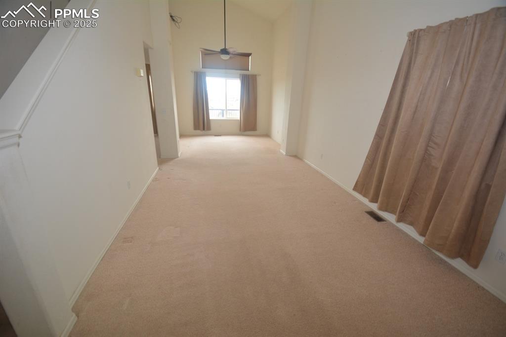 Image 7 of 48: From front door facing living room and dining room