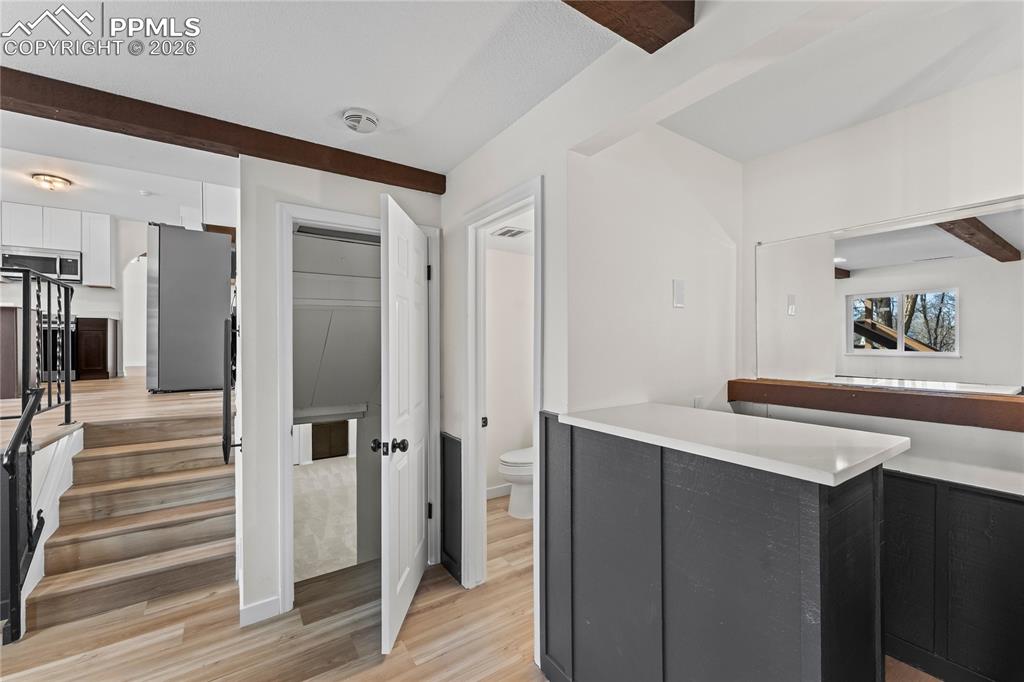 Image 19 of 47: Family room w/mini bar area