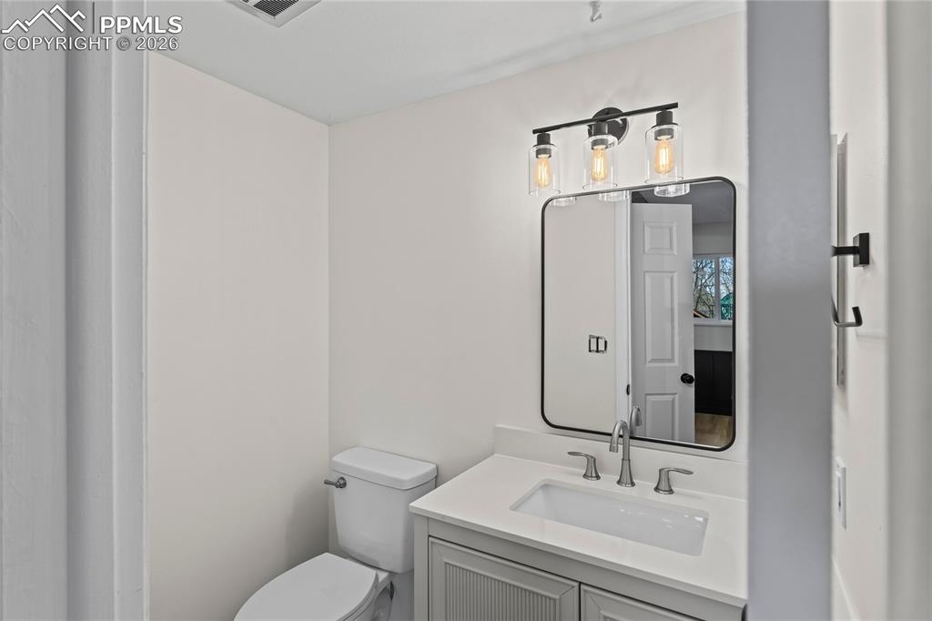 Image 20 of 47: 1/2 bath lower level