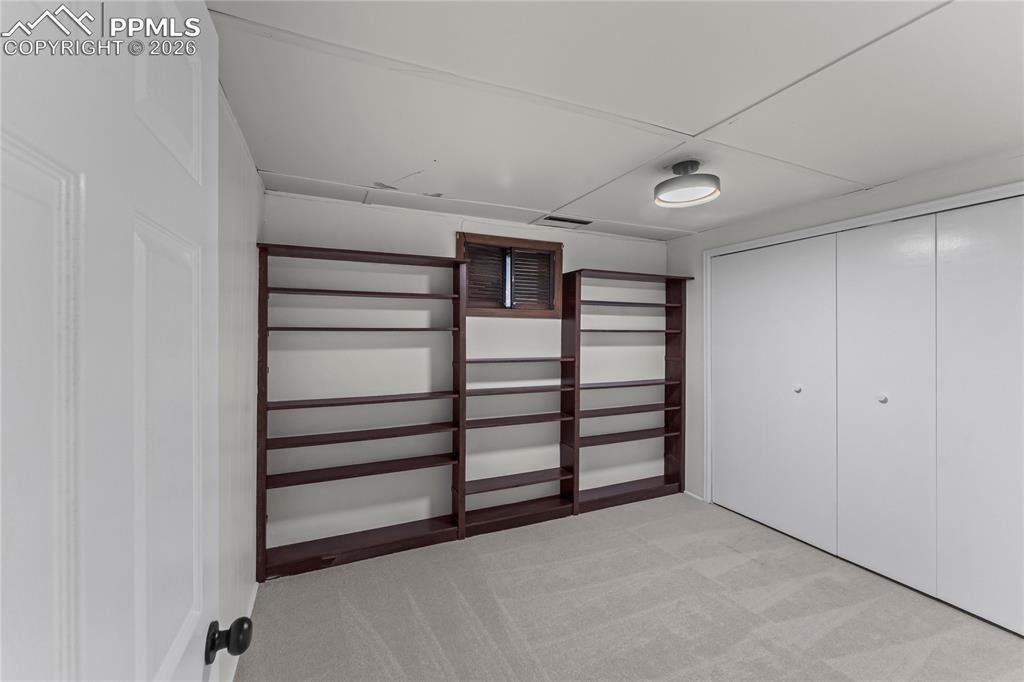 Image 32 of 47: basement bedroom