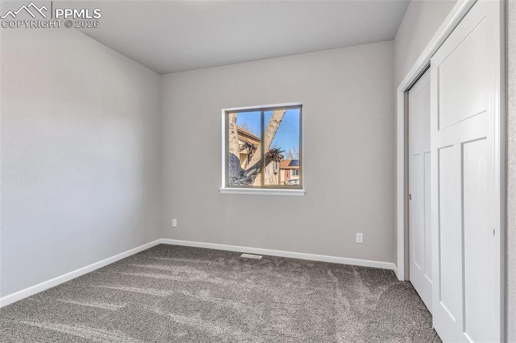 Image 10 of 13: Bedroom