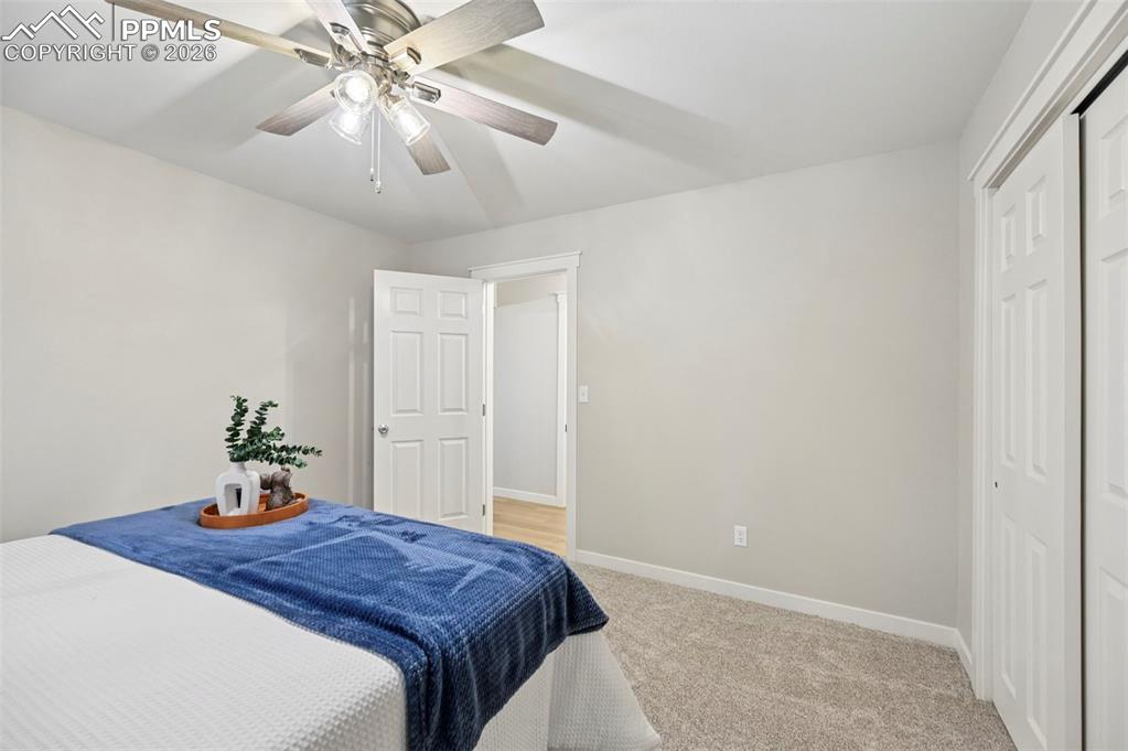 Image 21 of 50: 2nd bedroom - main