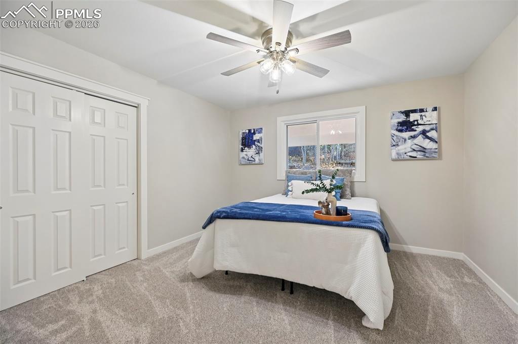 Image 22 of 50: 2nd bedroom - main