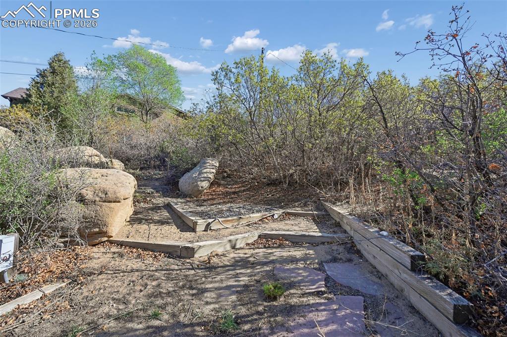 Image 41 of 50: Designated spot for hot tub with existing electrical outlet