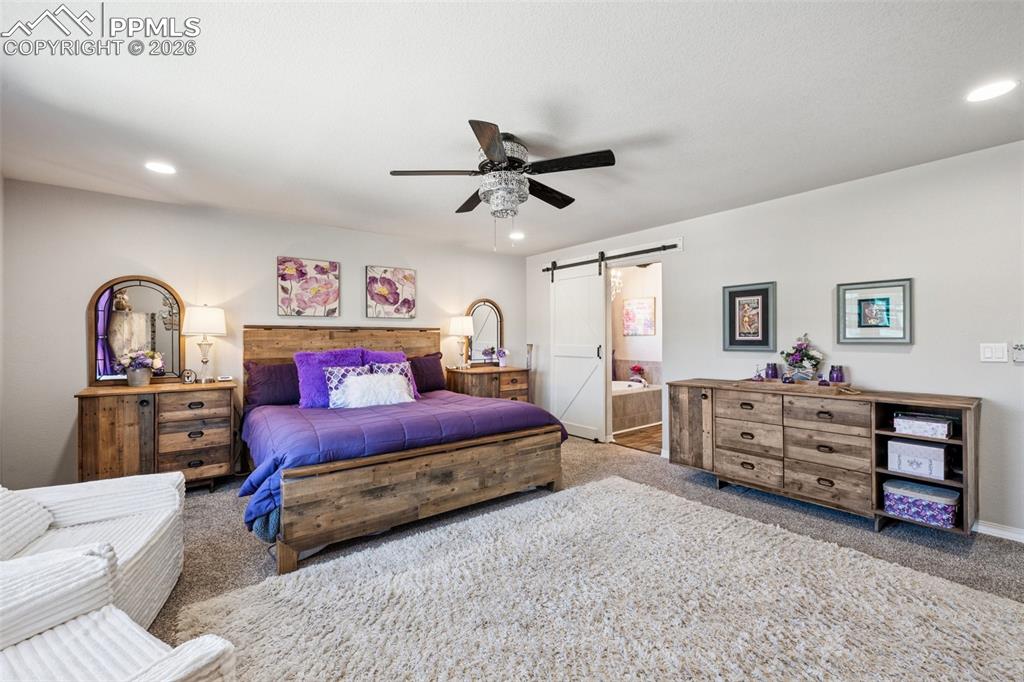 Image 20 of 50: Master Bedroom