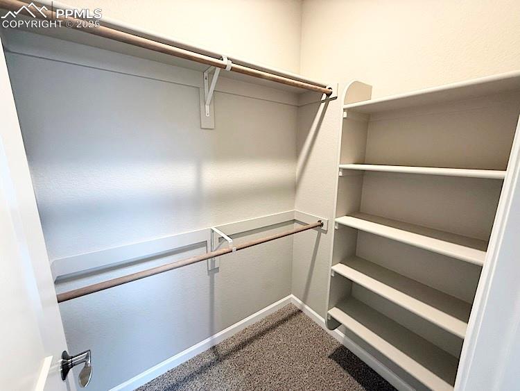 Image 23 of 30: Bedroom 3 Walk-in Closet