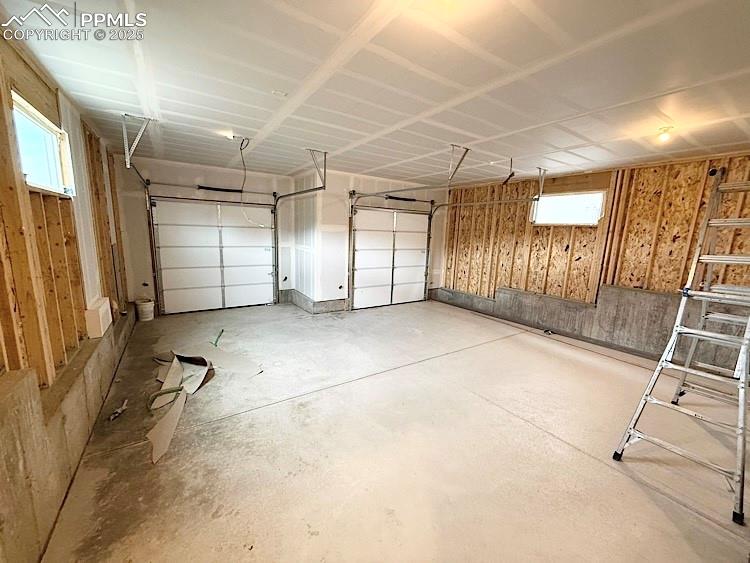 Image 27 of 30: 2 Car Tuck Under Alley Garage!