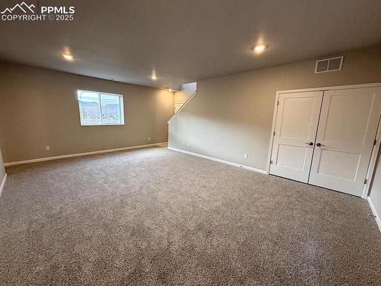 Image 34 of 46: Lower Level Family Room