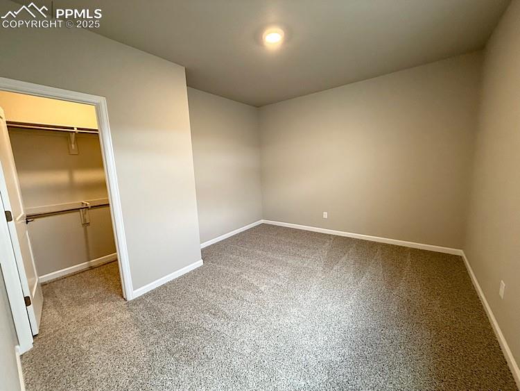 Image 36 of 46: 3rd Bedroom, located on the Lower Level with Walk-in Closet!