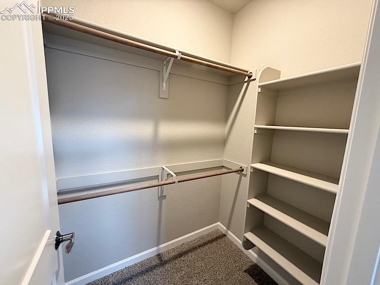 Image 37 of 46: Bedroom 3 Walk-in Closet