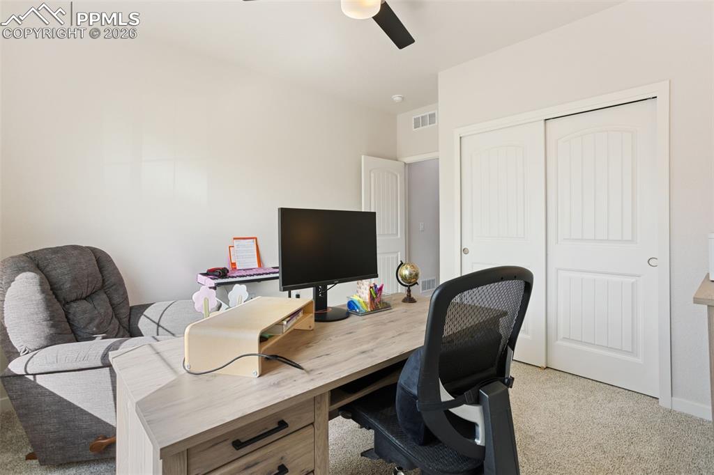 Image 17 of 41: Second bedroom/office main level