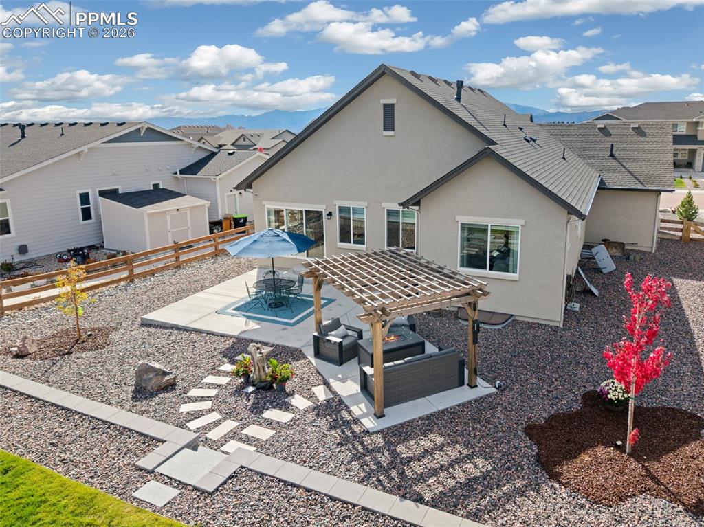 Image 30 of 41: Spacious lot with well designed landscaping, patio and yard