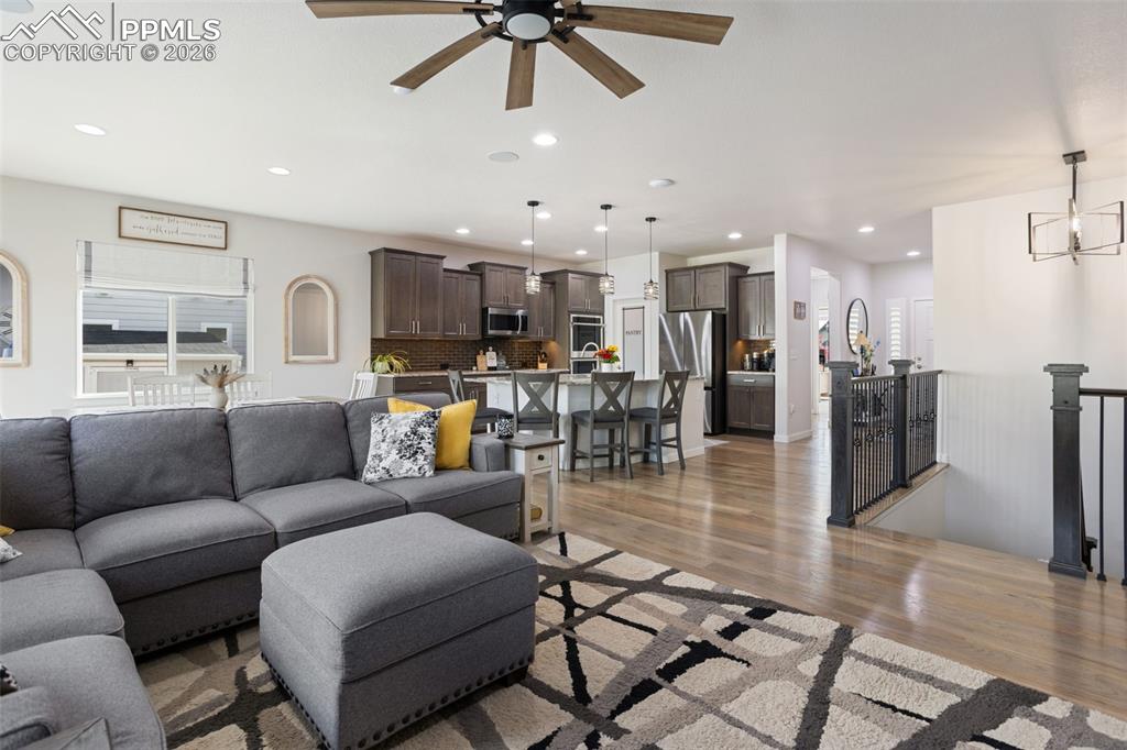 Image 9 of 41: View from living room to kitchen